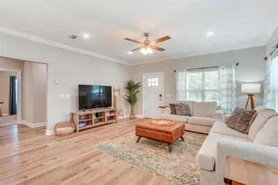 a living room with a couch and a tv at Family-Friendly Panama City Home Less Than 1 Mi to Beach in Panama City