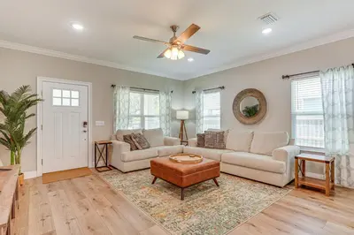 a living room with a couch and a ceiling fan at Family-Friendly Panama City Home Less Than 1 Mi to Beach in Panama City