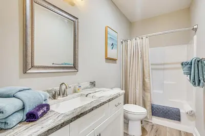 a bathroom with a sink and a toilet and a shower at Family-Friendly Panama City Home Less Than 1 Mi to Beach in Panama City