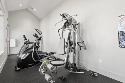 a gym with two exercise bikes in a room at Prominence North #54A - Barefoot Bungalow in Inlet Beach