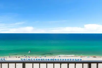 a view of a beach with people in the ocean at The Summit 1001 in Panama City Beach