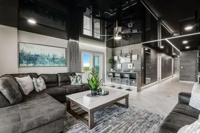 a living room with a couch and a coffee table at The Summit 1001 in Panama City Beach