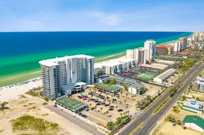 an aerial view of a beach with buildings and the ocean at Watercrest 1502 - Walkin’ on Sunshine in Panama City Beach