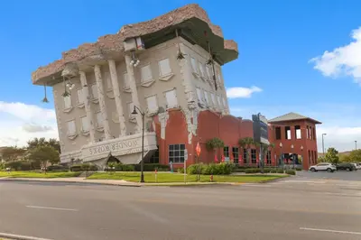 a large building on the corner of a street at Watercrest 1502 - Walkin’ on Sunshine in Panama City Beach
