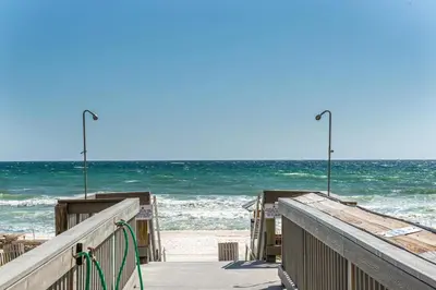 a view of the beach from a pier at Sunrise Beach #2107 in Panama City Beach