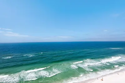 an aerial view of the ocean and a beach at Treasure Island 1806 in Panama City Beach