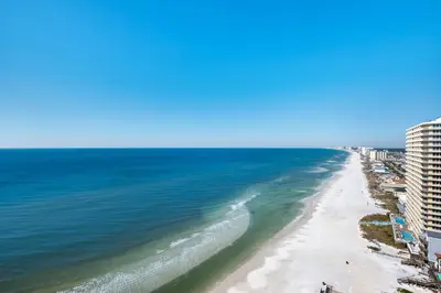 a view of the beach from the balcony of a condo at Treasure Island 1904 in Panama City Beach
