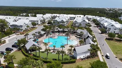 an aerial view of a resort with a pool at Ta-Da! Luxury 2BR Townhome, Golf Cart & Pool Access in Santa Rosa Beach