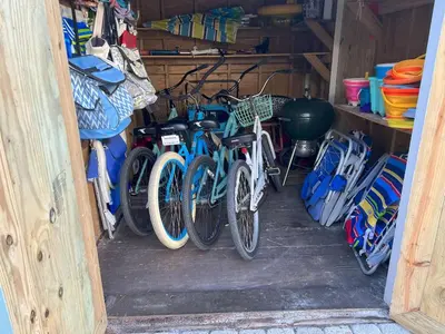 a group of bikes parked in a garage at Steps to Public & Private Beach in Seacrest FL 30A, Pool, Bikes, Gear, and More! in Seacrest