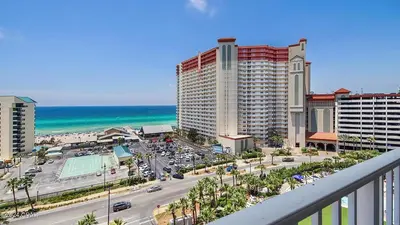 a view of a city with the ocean and buildings at Laketown Wharf 927 in Panama City Beach