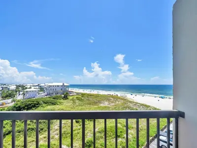 a view of the beach from the balcony of a condo at Pinnacle Port A-305 in Panama City Beach