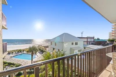 a view of the beach from the balcony of a house at Pelican Walk 312 in Panama City Beach
