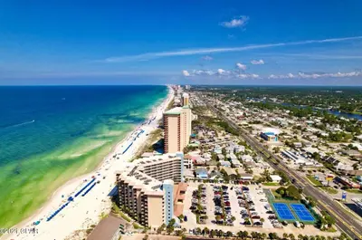 an aerial view of a beach and the ocean at Pelican Walk 404 in Panama City Beach