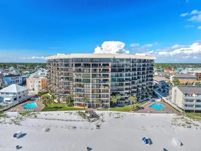 an aerial view of a large building on the beach at Pelican Walk 404 in Panama City Beach