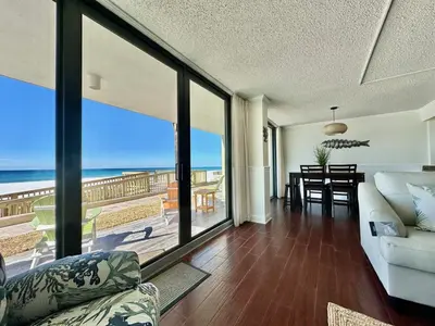 a living room with a view of the ocean at Pelican Walk 106 in Panama City Beach