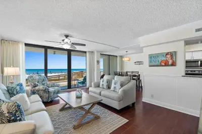 a living room with a view of the ocean at Pelican Walk 106 in Panama City Beach