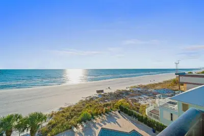 an aerial view of a beach and the ocean at Pelican Walk 509 in Panama City Beach