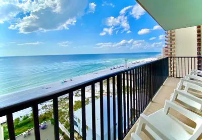 a balcony with a view of the beach and ocean at Pelican Walk 912 in Panama City Beach