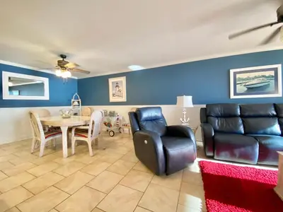 a living room with a couch and a table at Gulfgate 304 in Panama City Beach