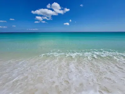 a view of the ocean from the beach at Pelican Walk 802 in Panama City Beach