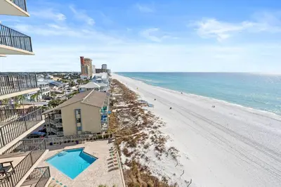 an aerial view of the beach and the ocean at Pelican Walk 806 in Panama City Beach