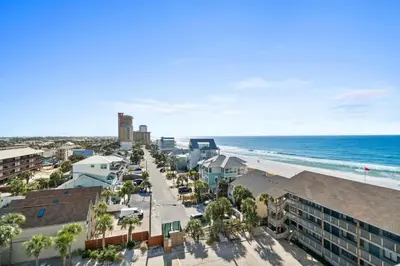 an aerial view of the beach and the ocean at Pelican Walk 801 in Panama City Beach