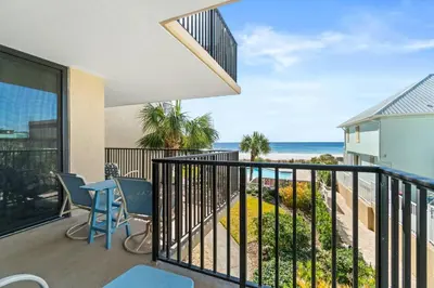 a balcony with a view of the beach at Pelican Walk 212 in Panama City Beach