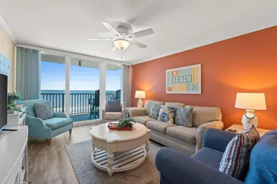 a living room with a couch and chairs at Pelican Walk 810 in Panama City Beach