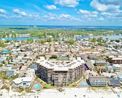 an aerial view of a resort with the ocean at Pelican Walk 810 in Panama City Beach