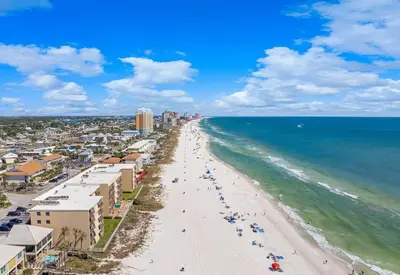 an aerial view of a beach and the ocean at Gulfgate 205 in Panama City Beach