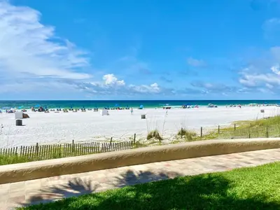 a view of a beach with people on it at Pelican Walk 107 in Panama City Beach