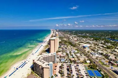 an aerial view of a beach and the ocean at Pelican Walk 206 in Panama City Beach