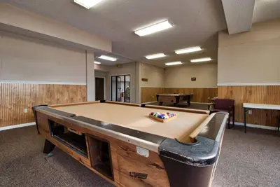 a conference room with a pool table in it at Renovated Townhome 5 mins walk to Beach, in the best resort in PCB, Horizon South in Panama City Beach