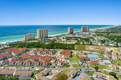 an aerial view of a resort next to the beach at Renovated Townhome 5 mins walk to Beach, in the best resort in PCB, Horizon South in Panama City Beach