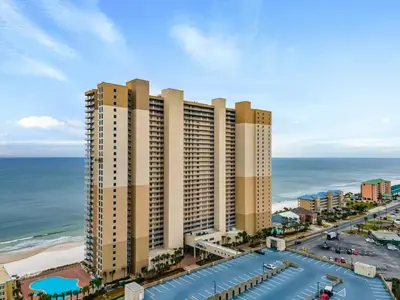an aerial view of a hotel on the beach at Stunning Beachfront Condo, Walk to Pier Park,Pools in Panama City Beach