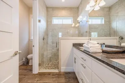 a bathroom with a shower and a sink at Southern Breeze - Private Pool - 100 Feet From The Beach! in Panama City Beach