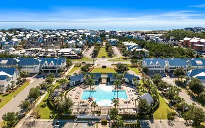 an aerial view of a resort with a pool at 12 Milestone Dr C by Oversee 30A in Inlet Beach