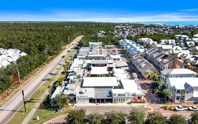 an aerial view of a town with houses at 12 Milestone Dr C by Oversee 30A in Inlet Beach