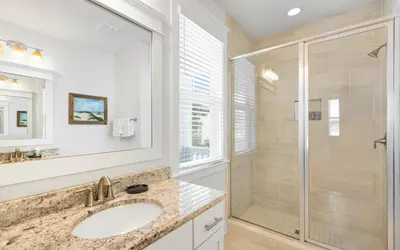 a bathroom with a shower and a sink at 310 Grande Pointe by Oversee 30A in Inlet Beach