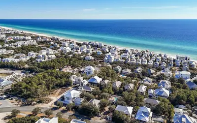 an aerial view of a resort near the beach at 94 Pinecrest by Oversee 30A in Inlet Beach