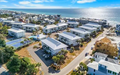 an aerial view of a town next to the ocean at Aqua Bella by Oversee 30A in Santa Rosa Beach
