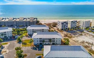 an aerial view of a resort near the beach at Aqua Bella by Oversee 30A in Santa Rosa Beach