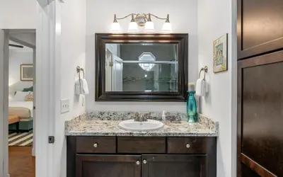 a bathroom with a sink and a mirror at Beach Bike Bungaleaux by Oversee 30A in Seacrest