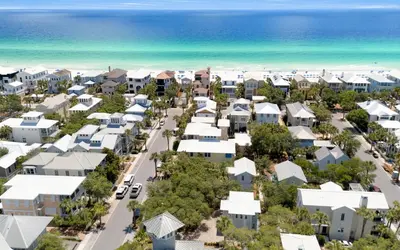 an aerial view of a residential neighborhood next to the beach at Bimini by Oversee 30A in Carillon Beach