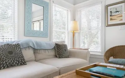 a living room with a couch and a table at Bimini by Oversee 30A in Carillon Beach