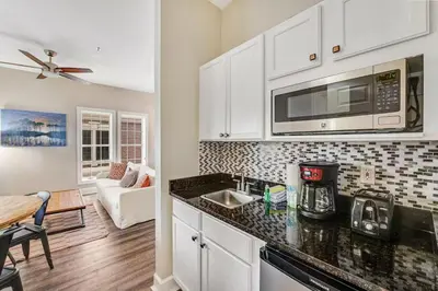 a kitchen with a counter top with a microwave at Village of South Walton B248 by Oversee 30A in Inlet Beach