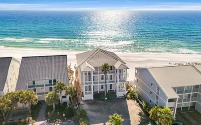 an aerial view of the beach and buildings at The Sea Goddess by Oversee 30A in Santa Rosa Beach