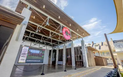 a building with a sign on the front of it at Casa De La Sirena by Oversee 30A in Seacrest