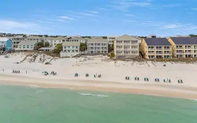 an aerial view of a beach with buildings at Leeward II Unit 4 by Oversee 30A in Santa Rosa Beach