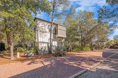 a house with a road in front of it at Naut 4 Sail by Oversee 30A in Seacrest